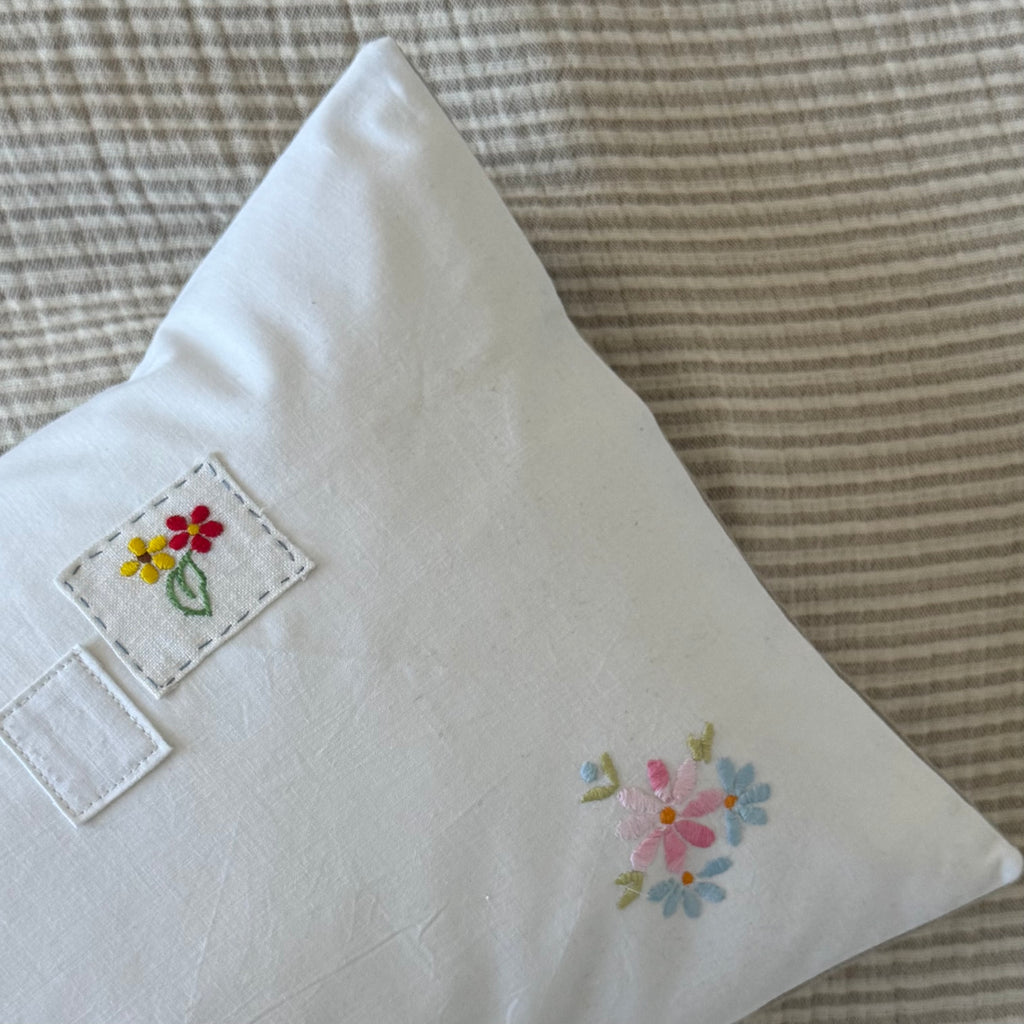 White up-cycled cushion