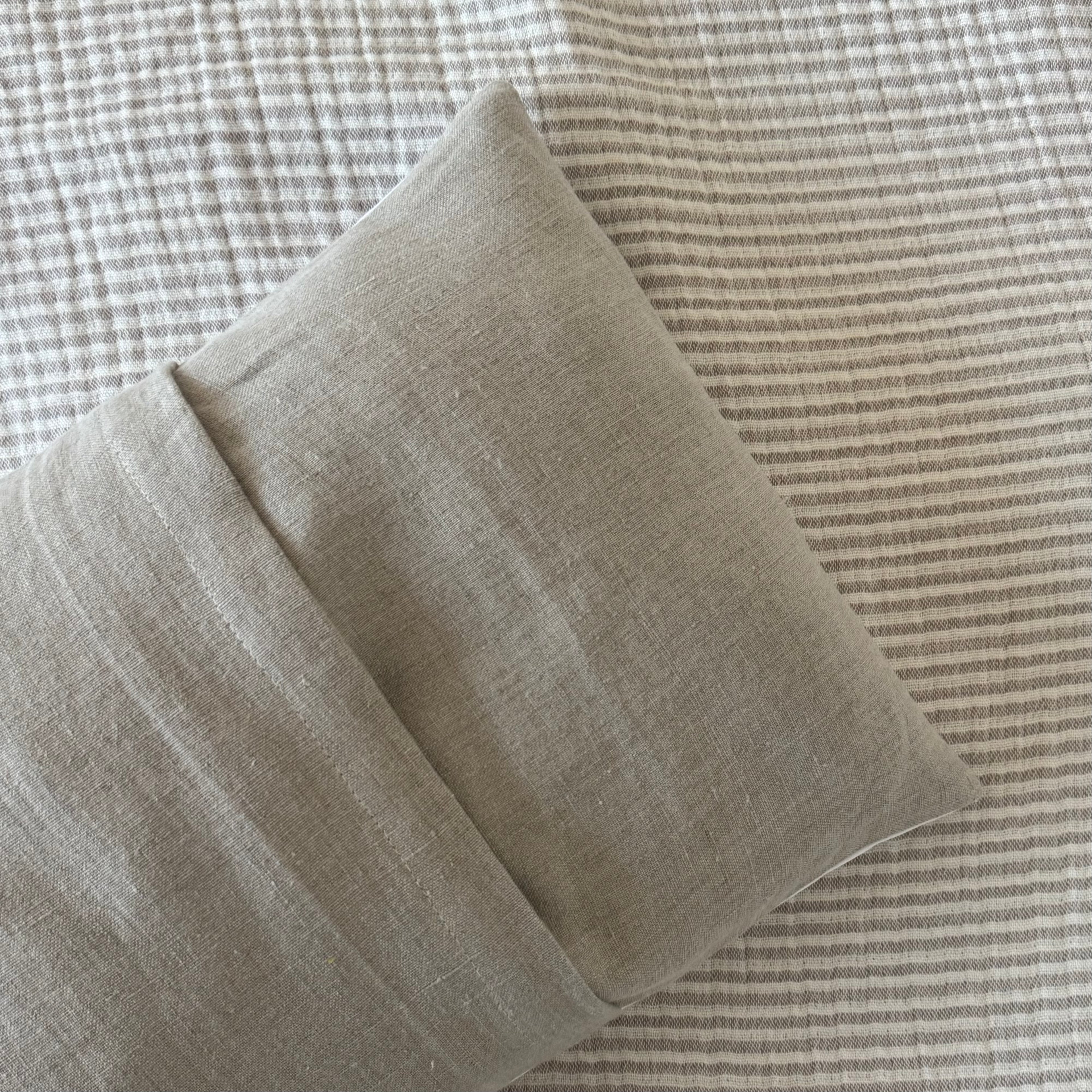 White up-cycled cushion