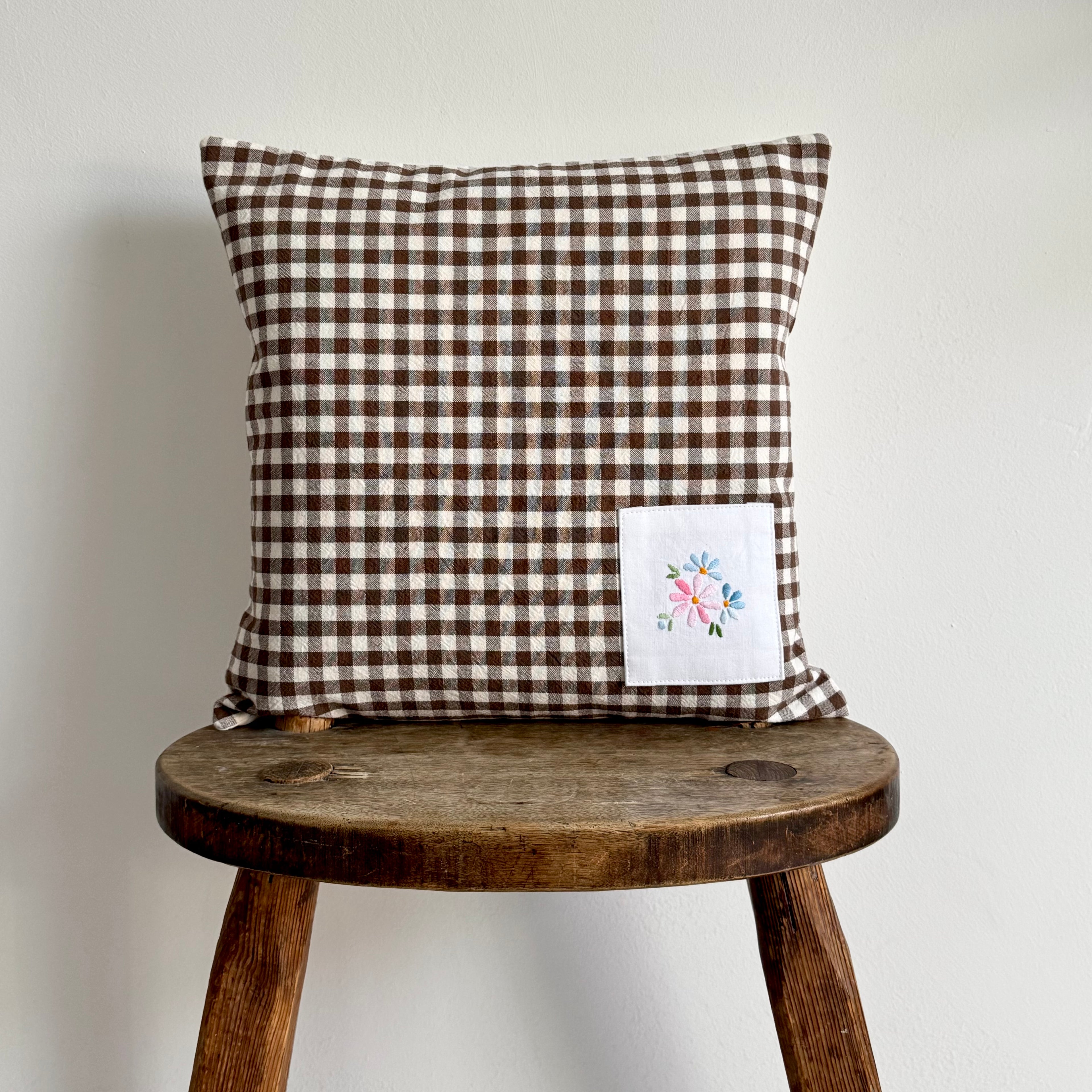 Brown & white gingham cushion