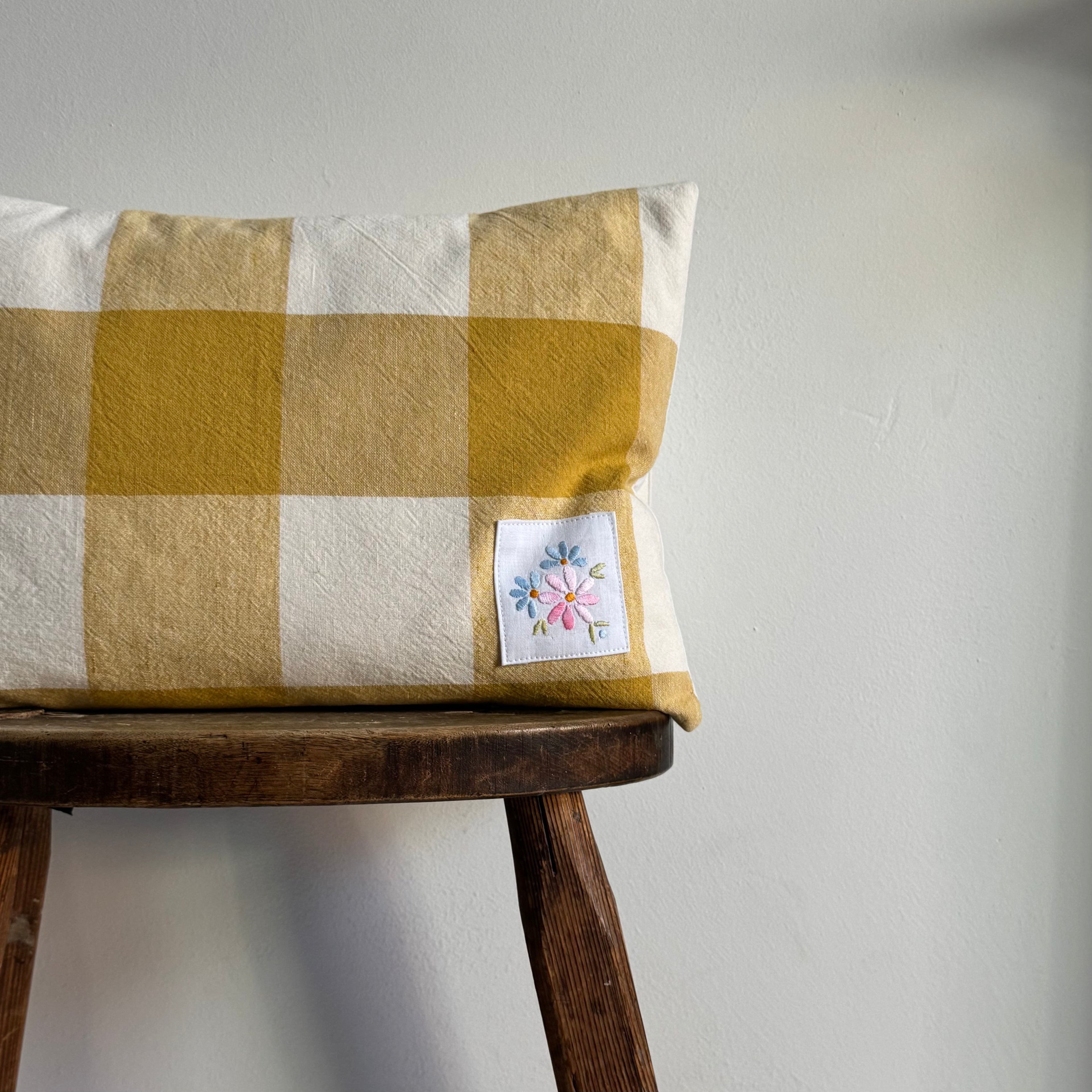 Marigold yellow checked cushion